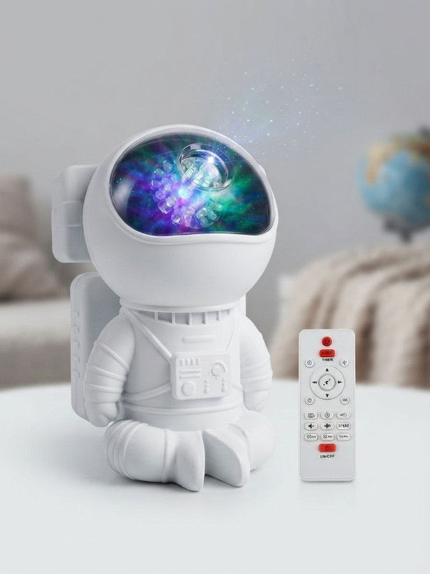 پروژکتور کهکشانی و چراغ خواب طرح فضانورد (Astronaut Galaxy Projector) - مدل نشسته